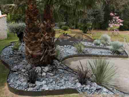 Jardin contemporain avec acier Corten riveduax plage - ile de Re